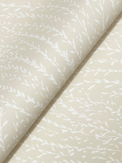 Transforming your sentence with the provided product data: “York Wallcoverings’ Willow Song Botanical Wallpaper features a rolled beige backdrop adorned with a subtle, white leafy branch pattern spread diagonally across the surface, creating a gentle, organic design.”.