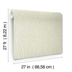 The Willow Song Botanical Wallpaper by York Wallcoverings is a roll of beige wallpaper featuring a white leaf pattern, measuring 27 feet (8.22 m) long and 27 inches (68.58 cm) wide.