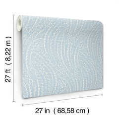 The Willow Song Botanical Wallpaper by York Wallcoverings is featured in a light blue color with a white leaf pattern. The roll measures 27 feet (8.22 m) in length and 27 inches (68.58 cm) in width.