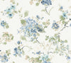 Introducing the Veiled Garden Floral Wallpaper from York Wallcoverings, featuring a watercolor-style design with blue, green, and beige flowers and leaves delicately scattered across a white background for a soft, elegant, and vintage-inspired look.