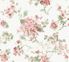 Veiled Garden Floral Wallpaper by York Wallcoverings features a watercolor-style floral pattern with pink, green, and beige flowers and leaves scattered across a white background.