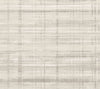 The Vanishing Point Striated Wallpaper by York Wallcoverings features a light beige and gray textured background enhanced with horizontal and vertical streaks, creating a subtle, linen-like pattern. The overall effect is soft and neutral.