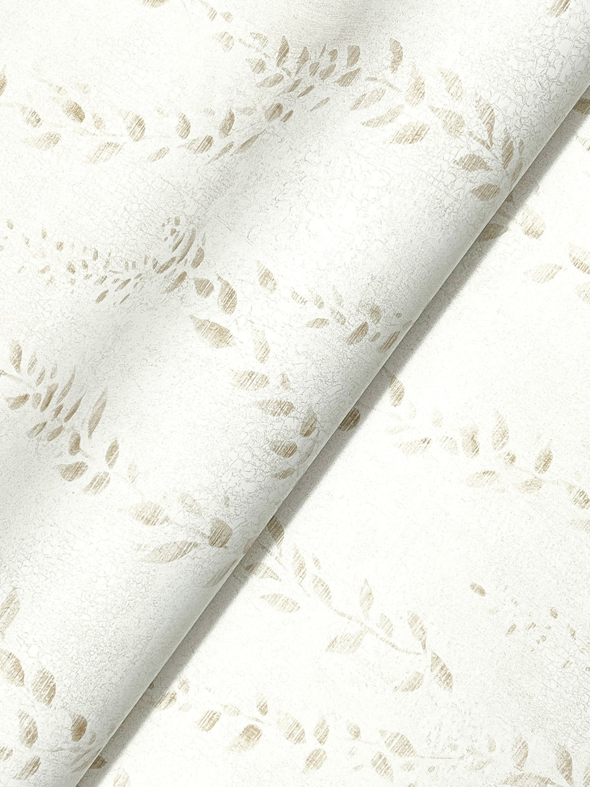 Close-up of the Alpenrose Vine Wallpaper by York Wallcoverings, featuring a white textured surface with a subtle beige leaf pattern in a diagonal, repetitive design; one section is gently folded over itself.