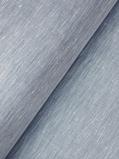 Close-up of Hempfield Weave Loomed Wallpaper by York Wallcoverings in light blue, featuring a subtle woven texture with visible threads, shown folded diagonally across the image.