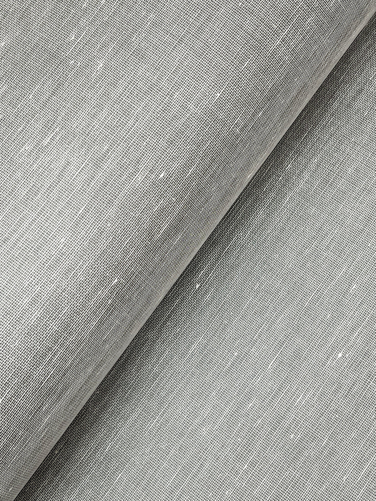 Close-up view of York Wallcoverings’ Hempfield Weave Loomed Wallpaper in light gray, showcasing its subtle texture and woven pattern. The wallpaper appears partially folded diagonally, accentuating the fine, natural fibers and gentle irregularities that add to its authentic look.