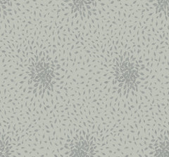 Petite Leaves Wallpaper by York Wallcoverings features a light grey pattern composed of petite, leaf-shaped motifs grouped in circular clusters against an off-white background, forming a repeating and symmetrical floral design.