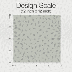 A 12x12 inch square displays a repeating leaf pattern from the Petite Leaves Wallpaper by York Wallcoverings. Axes on the left and bottom edges are marked in inches from 0 to 12, and the title at the top reads Design Scale (12 inch x 12 inch).