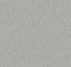 Experience a modern, minimalistic atmosphere with the Metallic Cascade Wallpaper by York Wallcoverings, featuring a light gray and white abstract pattern with vertical streaks reminiscent of brush strokes.