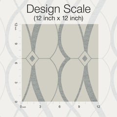 A 12x12 inch square sample of Graceful Geo Wallpaper by York Wallcoverings, showcasing a geometric pattern with curved gray lines and diamond shapes, overlaid with inch rulers along the top and left edges. Text reads “Design Scale (12 inch x 12 inch).”.