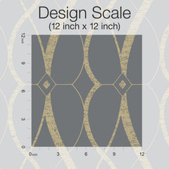 The “Graceful Geo Wallpaper” by York Wallcoverings is displayed in a gray and gold geometric pattern, with a 12 inch by 12 inch square marked to show the design scale and a ruler positioned along the left and bottom edges for reference.