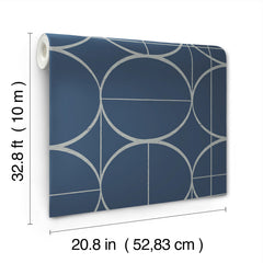 The Sun Circles Wallpaper by York Wallcoverings features a blue background with silver geometric circles and lines, and comes in a roll measuring 32.8 feet (10 meters) long by 20.8 inches (52.83 cm) wide.