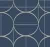 The Sun Circles Wallpaper by York Wallcoverings features a navy blue background adorned with intersecting white circles and straight lines, forming geometric shapes in a modern, symmetrical design.