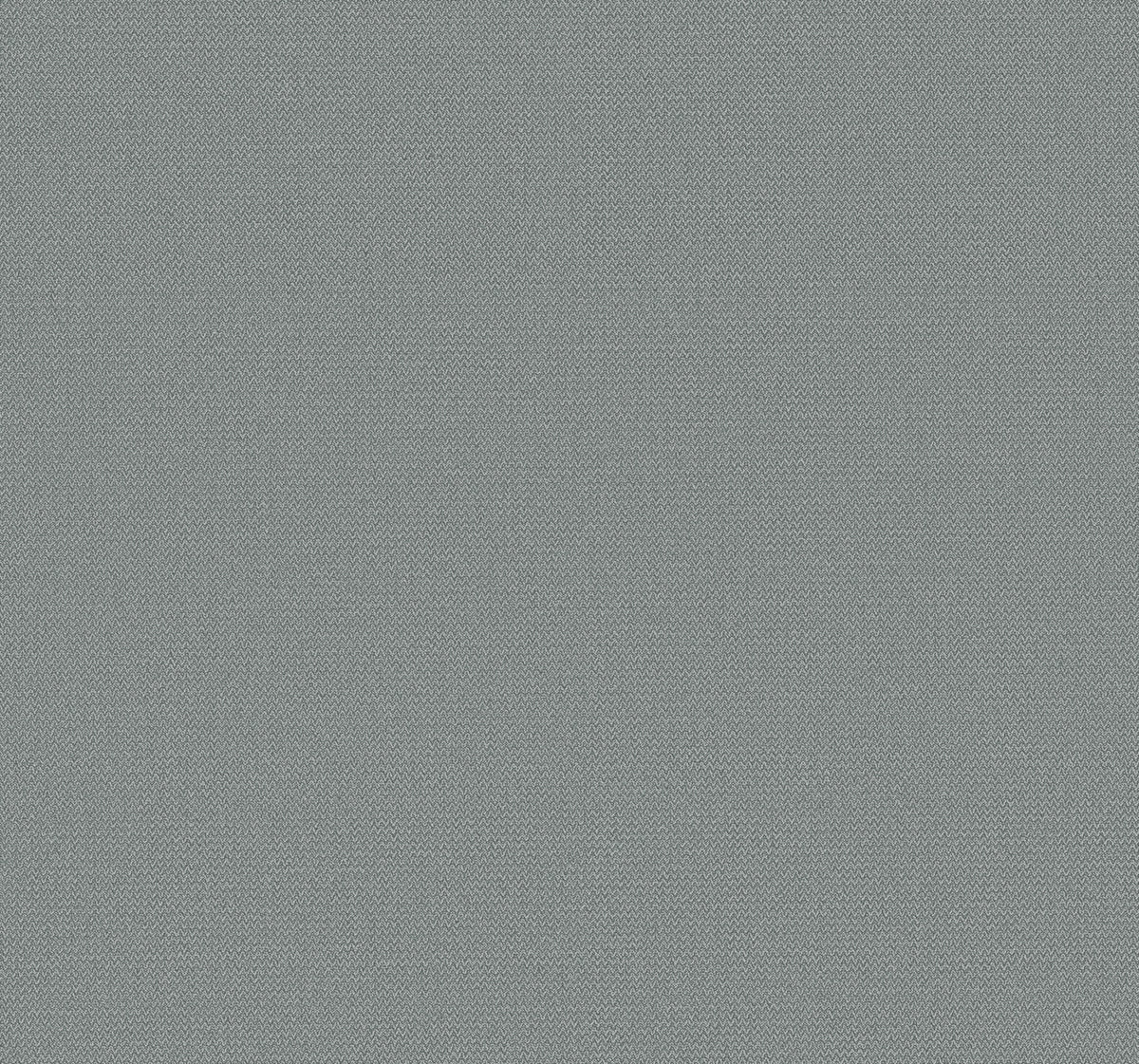 Chevronette Wallpaper by York Wallcoverings features a light blue textured surface with a subtle diagonal zigzag herringbone pattern. The texture is uniform and smooth throughout.