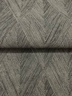 Magnolia Home Challenger Wallpaper in dark grey, featuring a repeating chevron or herringbone pattern created by fine vertical lines.