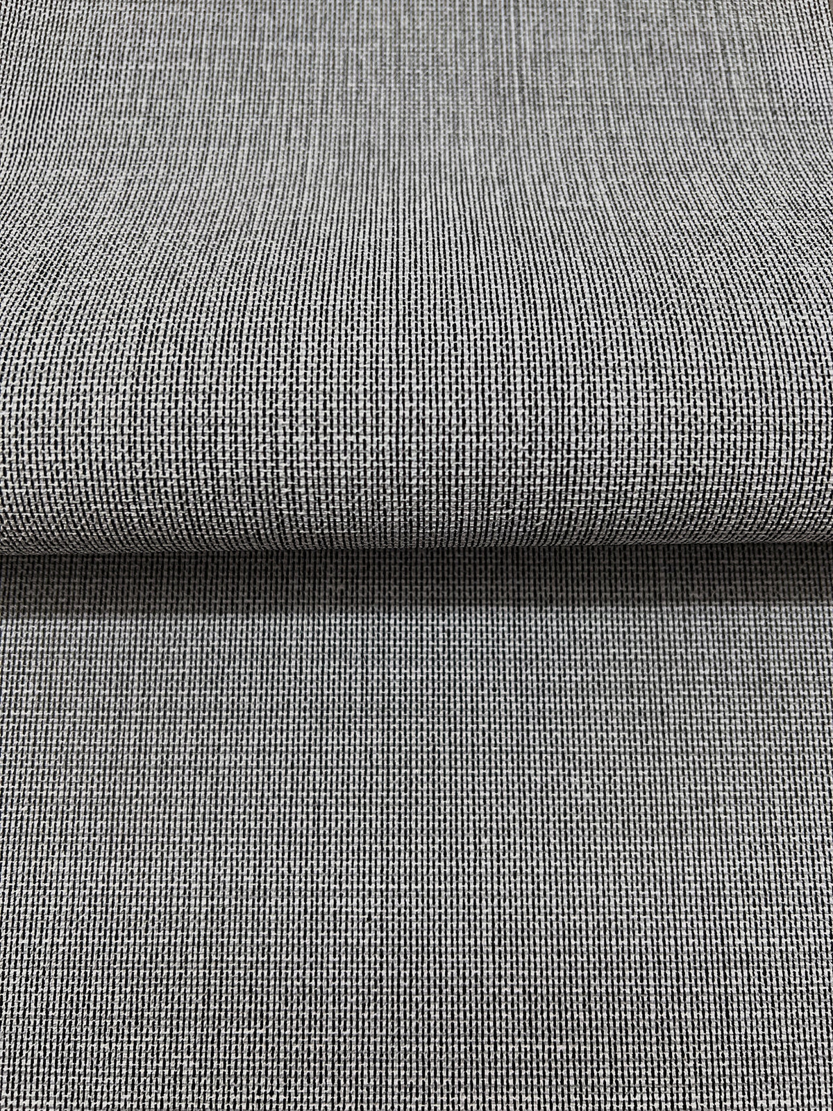 Magnolia Home Meadowbrook Wallpaper in gray with a textured, woven pattern.