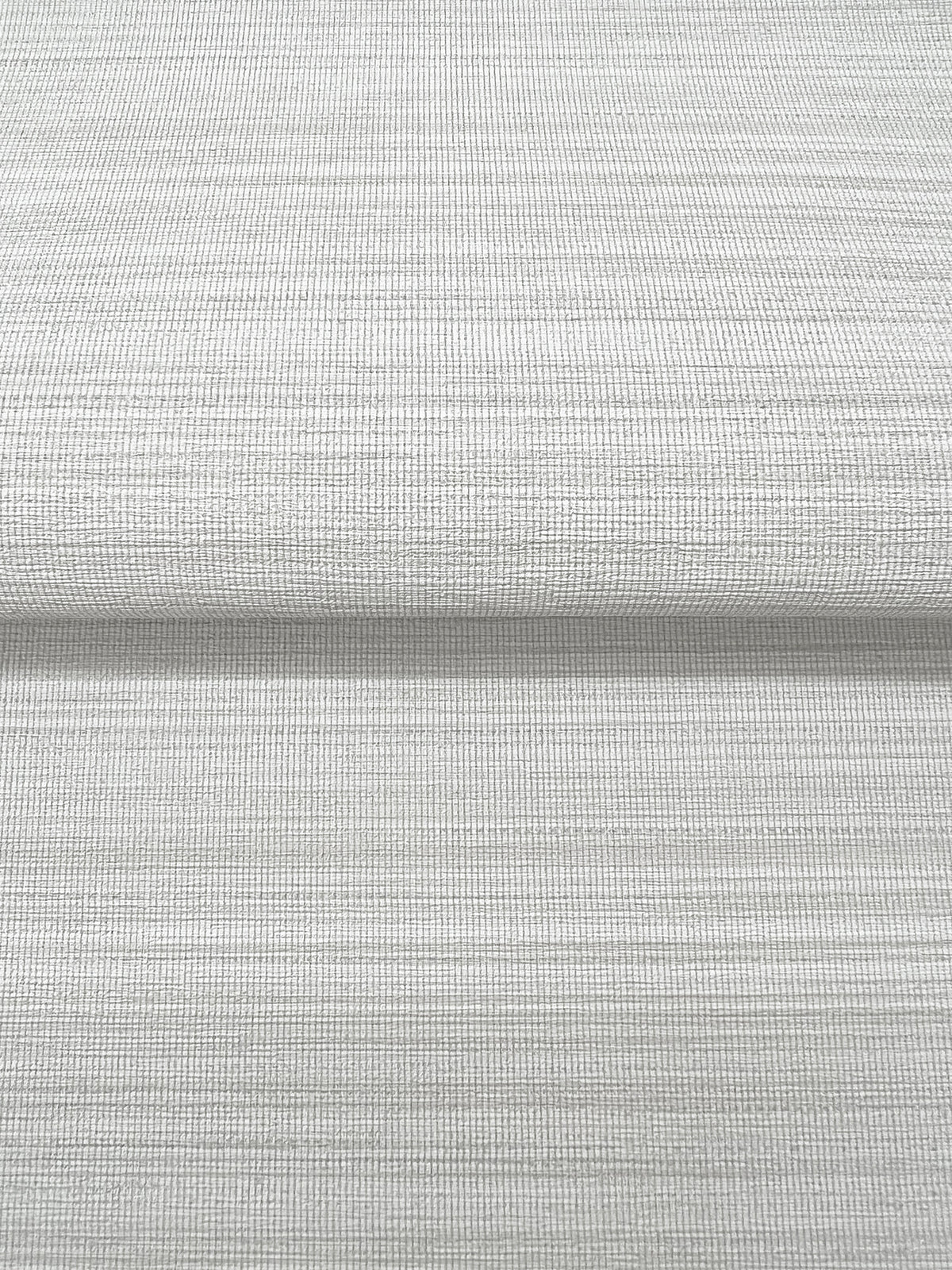 Magnolia Home Loomed Wallpaper in light gray with a subtle, horizontal woven texture.