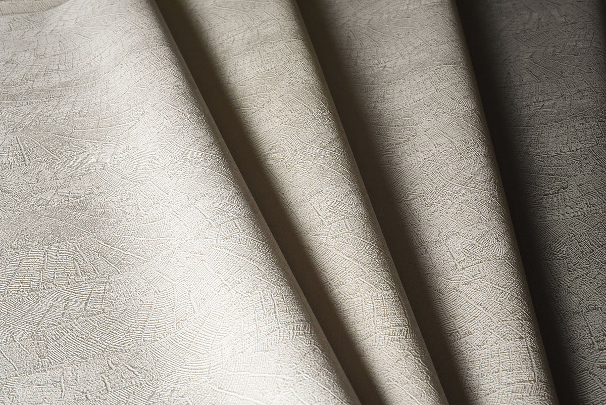 On Deck Wallpaper in beige with a subtle, fine-lined crosshatch texture, shown in folded overlapping sections.