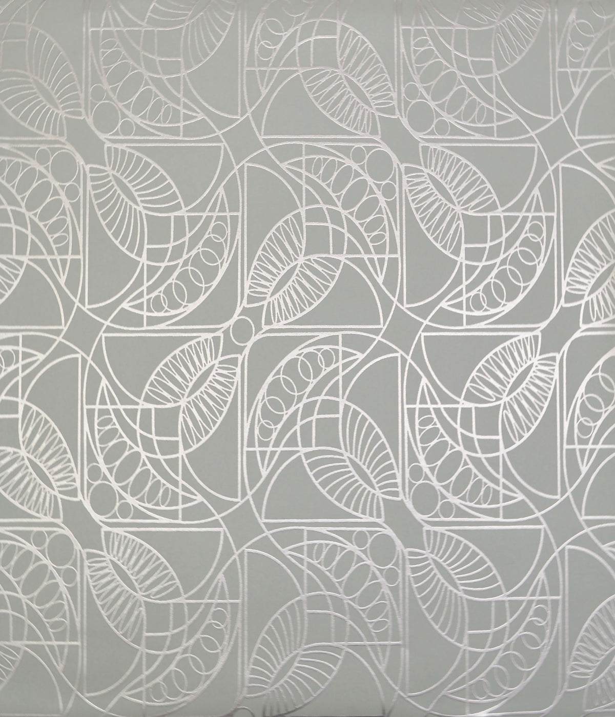 Cartouche Wallpaper featuring a repeating geometric pattern of white interlocking curved lines and stylized leaf shapes on a gray background.