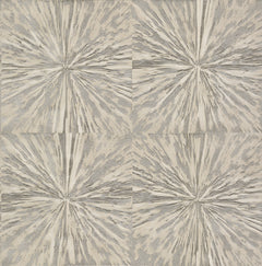 Squareburst Wallpaper by York Wallcoverings features a symmetrical, abstract design with a textured, radiating starburst pattern in shades of beige and gray.