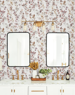 Double bathroom vanity with two rectangular mirrors and a light fixture mounted over York Wallcoverings Candice Olson Joyful Eucalpytus Wallpaper.