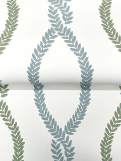 The Laureate Vine Trellis Wallpaper by York Wallcoverings features green and blue leafy vines arranged in repeating diamond and vertical patterns on a white background.