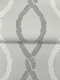 Laureate Vine Trellis Wallpaper by York Wallcoverings features a smooth gray background adorned with a repeating pattern of overlapping laurel wreaths in shades of gray and white, creating a diamond-like design.