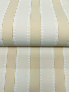 The Tilford Awning Stripe Wallpaper by York Wallcoverings features cream and beige stripes with alternating wide bands and narrow white patterned lines. The subtle sheen on the stripes adds a refined touch, and the partially unrolled roll showcases the elegant repeating design.