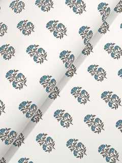Sylvie Floral Wallpaper by York Wallcoverings features a white background adorned with repeating diagonal rows of blue flowers and dark gray leaves.