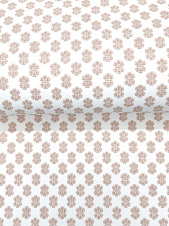 The Brioni Floral Stamp Wallpaper by York Wallcoverings features a repeating pattern of small, light brown floral designs on a white background, with the flowers evenly spaced in a grid-like arrangement.