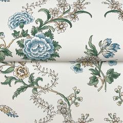 Genevieve Floral Trail Wallpaper by York Wallcoverings features blue, green, and beige flowers and leaves on a white background. Its repeating pattern offers an elegant, vintage-inspired style.