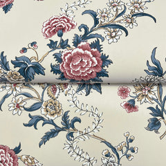 Genevieve Floral Trail Wallpaper by York Wallcoverings showcases large red, pink, and cream flowers with blue-green leaves on a light beige background, featuring a repeating floral pattern across the surface.