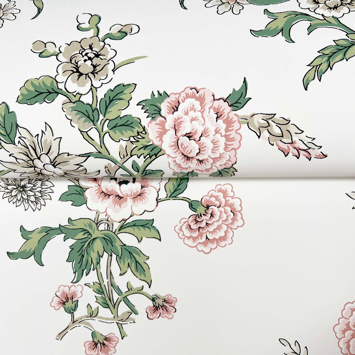 Genevieve Floral Trail Wallpaper by York Wallcoverings features a white background adorned with pink, white, and green flowers and leaves. The floral pattern repeats seamlessly across overlapping seams.