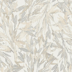 Rainforest Leaves Wallpaper by York Wallcoverings features subtle watercolor leaves in soft beige, gray, and cream tones overlapping on a white textured background for a gentle botanical look.